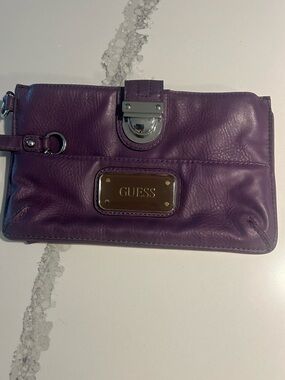 GUESS Purple Leather Wristlet Clutch with Gold-Tone Plate And Silver Hardware